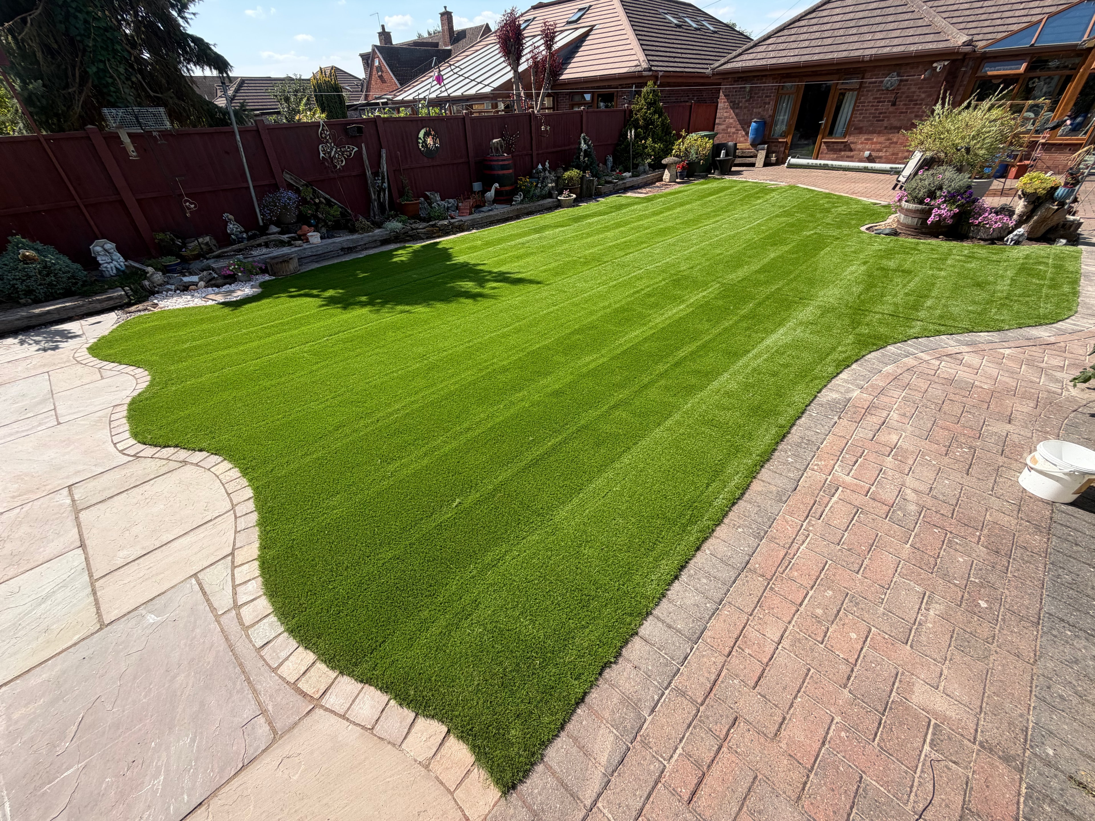 Artificial grass installation in progress